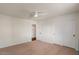 Bedroom featuring a ceiling fan and closet with sliding doors at 6102 E Danbury Rd, Scottsdale, AZ 85254