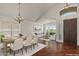 Staged dining room showcases hardwood floors, natural light, and an open floor plan at 6102 E Danbury Rd, Scottsdale, AZ 85254