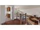 Open interior showcasing kitchen and office from the upper level at 6102 E Danbury Rd, Scottsdale, AZ 85254