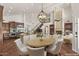 Elegant space with a living room, dining area, hardwood floors, and soaring ceilings, ideal for gatherings at 6102 E Danbury Rd, Scottsdale, AZ 85254
