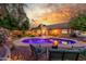This home's backyard features a pool, and outdoor kitchen, and a relaxing seating area at 6918 W Villa Hermosa W --, Glendale, AZ 85310
