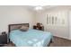 This bedroom has shutters and neutral colors to create a restful retreat at 6918 W Villa Hermosa W --, Glendale, AZ 85310