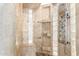 This stylish primary bathroom includes a walk-in shower with multiple shower heads at 6918 W Villa Hermosa W --, Glendale, AZ 85310
