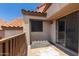 The balcony features tan stucco and a partial view of the red tile roof at 700 E Mesquite Cir # O210, Tempe, AZ 85288