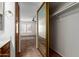 A mirrored closet door and a bathroom vanity are featured in this home's interior at 700 E Mesquite Cir # O210, Tempe, AZ 85288