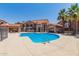 Inviting community pool with clear blue water and ample deck space surrounded by desert landscaping and community buildings at 700 E Mesquite Cir # O210, Tempe, AZ 85288