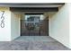 Striking front entryway with modern horizontal slat gate providing curb appeal and privacy at 720 E Chilton Dr, Tempe, AZ 85283