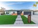 Charming single-story home with well-manicured lawn, striking a balance between modern style and curb appeal at 720 E Chilton Dr, Tempe, AZ 85283