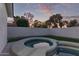 A close up detail showing a relaxing hot tub in the landscaped backyard at 720 E Chilton Dr, Tempe, AZ 85283