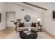 Inviting living room with vaulted ceilings, wooden beams, and neutral decor at 720 E Chilton Dr, Tempe, AZ 85283