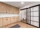 Ample cabinet storage with sliding doors leading to the bonus room at 720 E Chilton Dr, Tempe, AZ 85283
