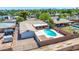 Aerial view of the property showcasing the pool, patio, and backyard layout with surrounding neighborhood at 724 W Missouri Ave, Phoenix, AZ 85013