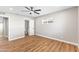 A bright bedroom with wood laminate flooring is equipped with a ceiling fan at 724 W Missouri Ave, Phoenix, AZ 85013