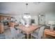 Open-concept living space featuring a dining area that adjoins the kitchen and Gathering room at 7712 S 64Th Ln, Laveen, AZ 85339