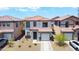 Charming two-story home with a tile roof, a well-manicured yard, and an attached one car garage at 7712 S 64Th Ln, Laveen, AZ 85339