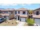 Charming two-story home featuring stucco exterior, a tile roof and a single car garage at 7712 S 64Th Ln, Laveen, AZ 85339