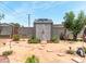 Backyard with a shed and a stepping stone pathway at 8116 N 55Th Dr, Glendale, AZ 85302