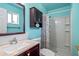 Updated bathroom with modern vanity, decorative mirror, and shower at 8116 N 55Th Dr, Glendale, AZ 85302