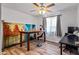 Bedroom/office with bright natural light and wood flooring at 8116 N 55Th Dr, Glendale, AZ 85302