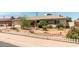 Single-story home with drought-resistant landscaping, a picket fence, and neutral exterior paint at 8116 N 55Th Dr, Glendale, AZ 85302