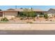 Single-story home featuring a landscaped front yard with small plants and minimal design elements at 8116 N 55Th Dr, Glendale, AZ 85302