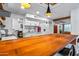 Spacious kitchen featuring a long butcher block island and stainless steel appliances at 8116 N 55Th Dr, Glendale, AZ 85302