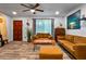 Living room featuring wood floors, a wood coffee table, and neutral walls at 8116 N 55Th Dr, Glendale, AZ 85302