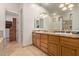 Bathroom with a double vanity and granite countertops at 8689 E Krail St, Scottsdale, AZ 85250