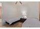 Bedroom featuring two twin beds with classic nightstands and decor at 8689 E Krail St, Scottsdale, AZ 85250