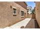 Backyard with stucco wall and concrete patio at 89 E Palomino Dr, Gilbert, AZ 85296