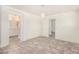 Bedroom featuring neutral walls, wood-look floors, and access to an en-suite bathroom at 89 E Palomino Dr, Gilbert, AZ 85296