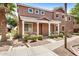 Two-story home featuring neutral paint, covered porch, and low-maintenance landscaping in a desirable location at 89 E Palomino Dr, Gilbert, AZ 85296