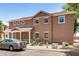 Two-story home featuring neutral paint, covered porch, and low-maintenance landscaping in a desirable location at 89 E Palomino Dr, Gilbert, AZ 85296