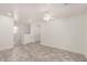 A bright room showcasing wood-look flooring, white walls, a ceiling fan, and recessed lighting fixtures at 89 E Palomino Dr, Gilbert, AZ 85296