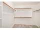 Walk-in closet with ample storage space and wood-look floors at 89 E Palomino Dr, Gilbert, AZ 85296