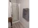 Clean and functional bathroom featuring a glass-enclosed shower and towel rack at 920 E Devonshire Ave # 2031, Phoenix, AZ 85014
