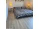 Comfortable bedroom with a bed, side tables, lamps, and stylish decor, creating a relaxing atmosphere at 920 E Devonshire Ave # 2031, Phoenix, AZ 85014