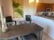 Stylish dining area features a table with seating, and decor with access to the kitchen at 920 E Devonshire Ave # 2031, Phoenix, AZ 85014