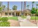 Inviting single-story home boasts mature landscaping, a covered entry, and a well-manicured lawn at 920 E Devonshire Ave # 2031, Phoenix, AZ 85014
