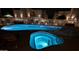 Sparkling community pool and spa area illuminated at night, perfect for relaxation and enjoyment at 920 E Devonshire Ave # 2031, Phoenix, AZ 85014