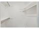 An empty closet with simple shelving and a hanging rod at 9802 N Balboa Dr, Sun City, AZ 85351