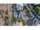 Aerial view of a backyard pool and landscaping in a desert home neighborhood at 9921 E Doubletree Ranch Rd, Scottsdale, AZ 85258