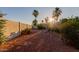 The backyard features low-maintenance desert landscaping with gravel and a privacy wall at 9921 E Doubletree Ranch Rd, Scottsdale, AZ 85258
