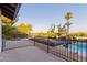Enjoy the backyard views from this balcony with iron railing overlooking the pool at 9921 E Doubletree Ranch Rd, Scottsdale, AZ 85258