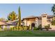 Inviting home exterior with manicured lawn and elegant entryway with grand architectural details at 9921 E Doubletree Ranch Rd, Scottsdale, AZ 85258