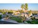 Beautiful desert home featuring verdant landscaping and large circular driveway at 9921 E Doubletree Ranch Rd, Scottsdale, AZ 85258