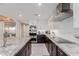 Modern kitchen featuring granite countertops, stainless steel appliances, and white subway tile backsplash at 9921 E Doubletree Ranch Rd, Scottsdale, AZ 85258