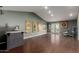 Open concept living space with a bar, recessed lighting, and wood flooring, perfect for entertaining at 9921 E Doubletree Ranch Rd, Scottsdale, AZ 85258