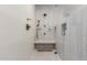 Walk-in shower features elegant tile, bench seating, and bronze fixtures at 9921 E Doubletree Ranch Rd, Scottsdale, AZ 85258