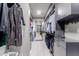 Spacious walk-in closet with custom shelving and ample storage space at 9921 E Doubletree Ranch Rd, Scottsdale, AZ 85258